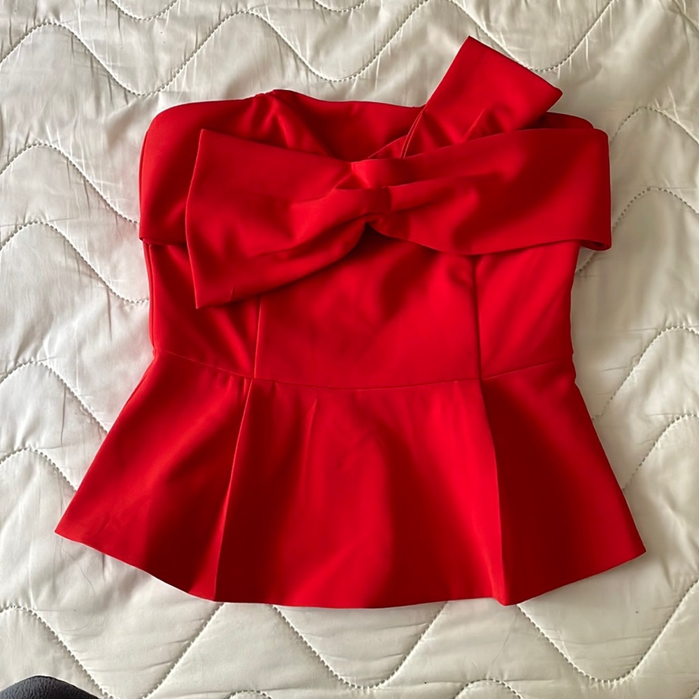 Anthropologie red peplum top.